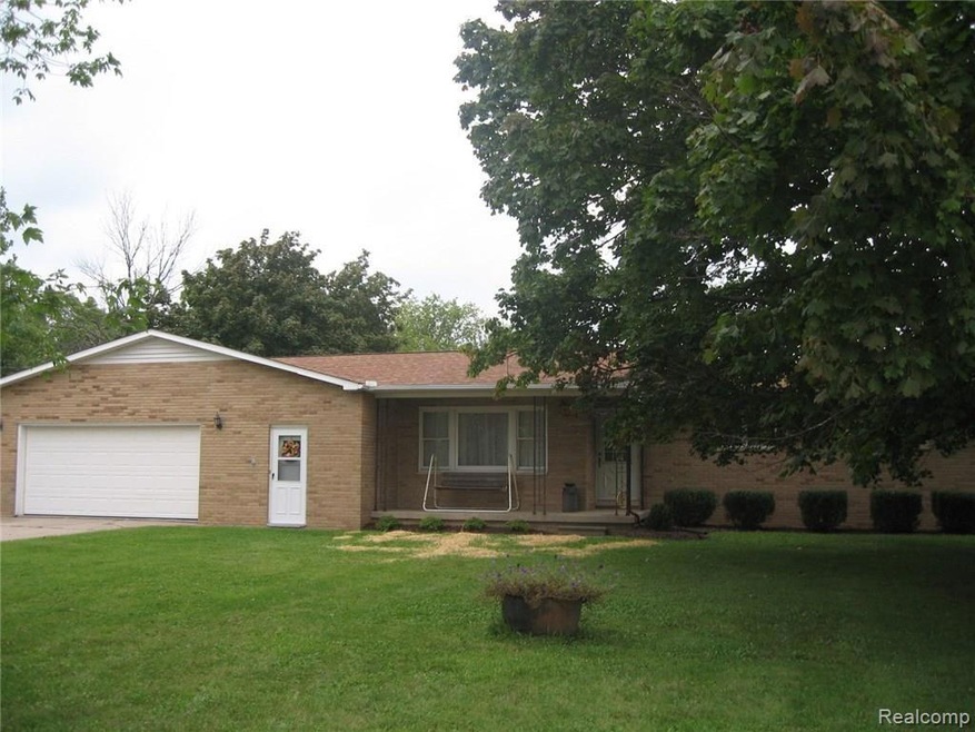 All brick ranch/over-sized 2-car garage