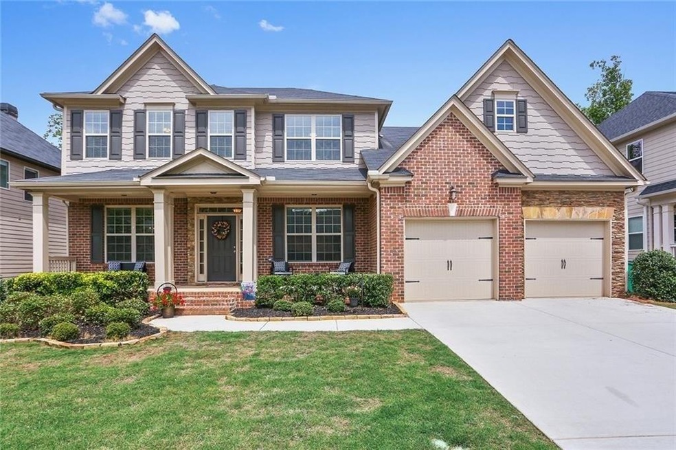 Brick, shake and stone adorn this beautiful baseme