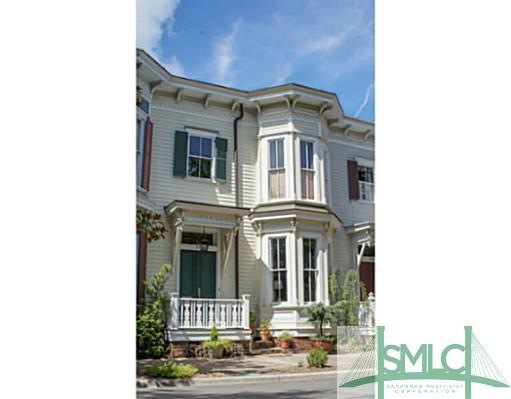 Exterior Front. Gorgeous Victorian townhome!