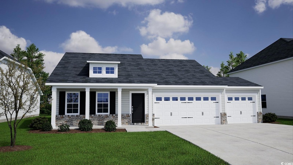 View of front facade featuring a garage and a fron