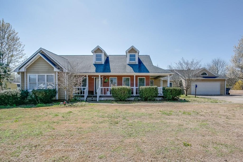 Charming Cape Cod style Ranch with quaint front po
