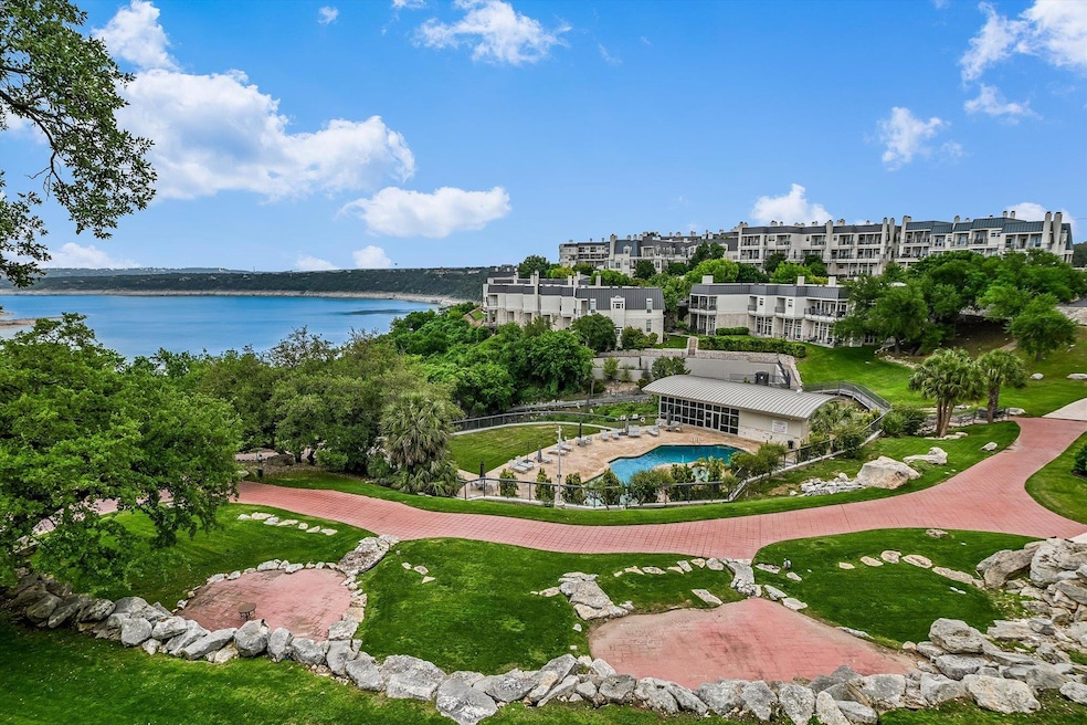 View of property's community featuring fence and 