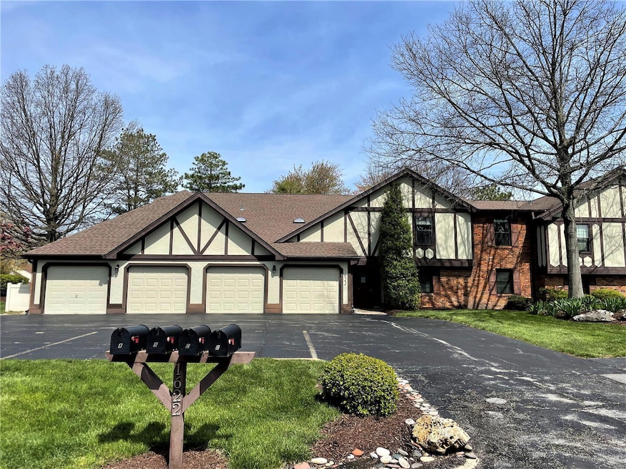 2BR/2BA upper unit, one-level condo w/attached gar