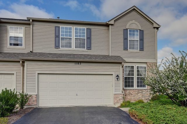 North- East facing home with brick and vinyl sidin