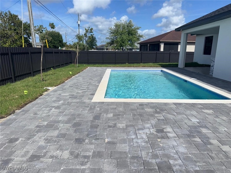 View of pool featuring a fenced in pool, a fenced