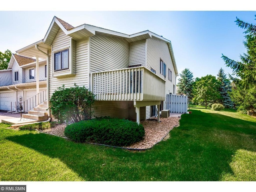 Large side yard with deck and patio and private he