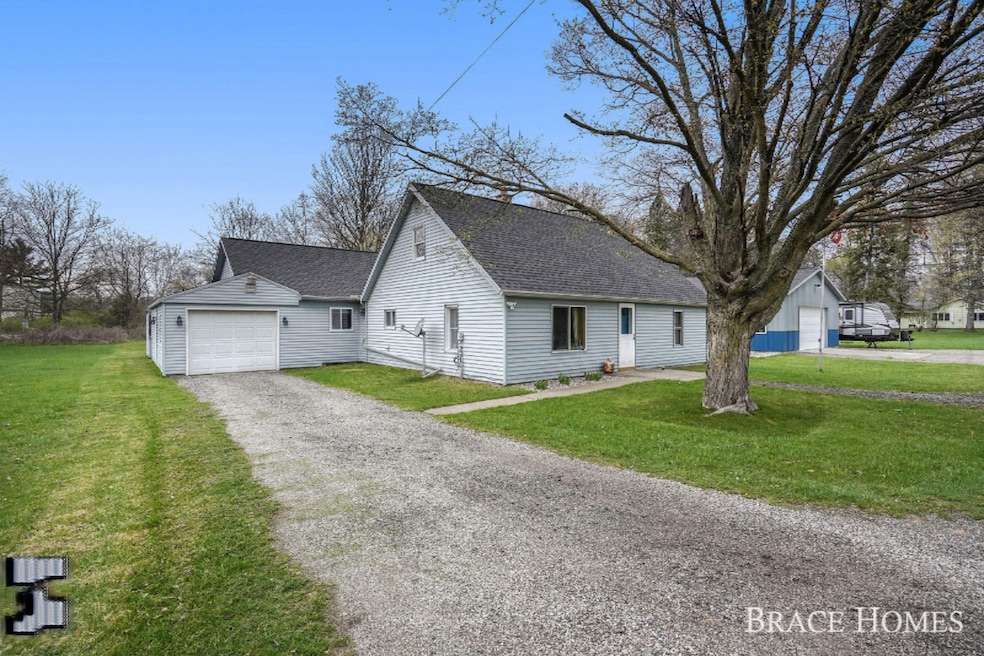 1030 Hunt St SE, Lowell, MI 49331 - photo 1