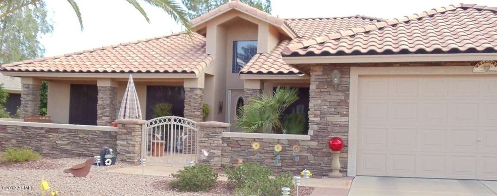Front of Home with Desert Landscape