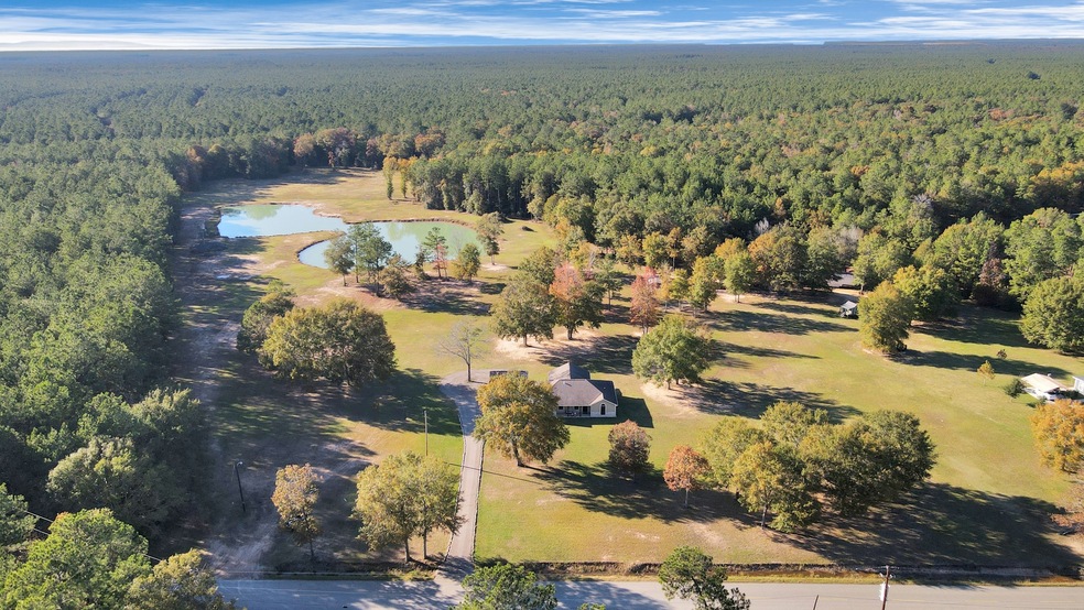 11250 Daw Collins Rd, Splendora, TX 77372 - photo 1