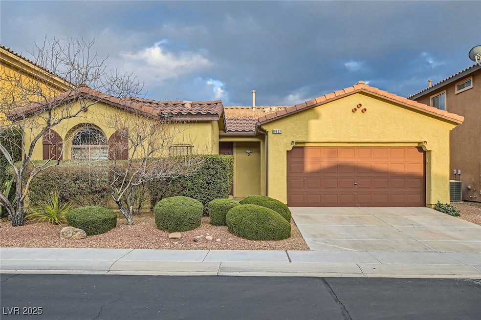 Mediterranean / spanish home with central AC unit,