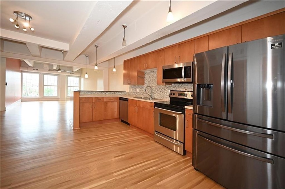 Kitchen looking into the spacious family room.
