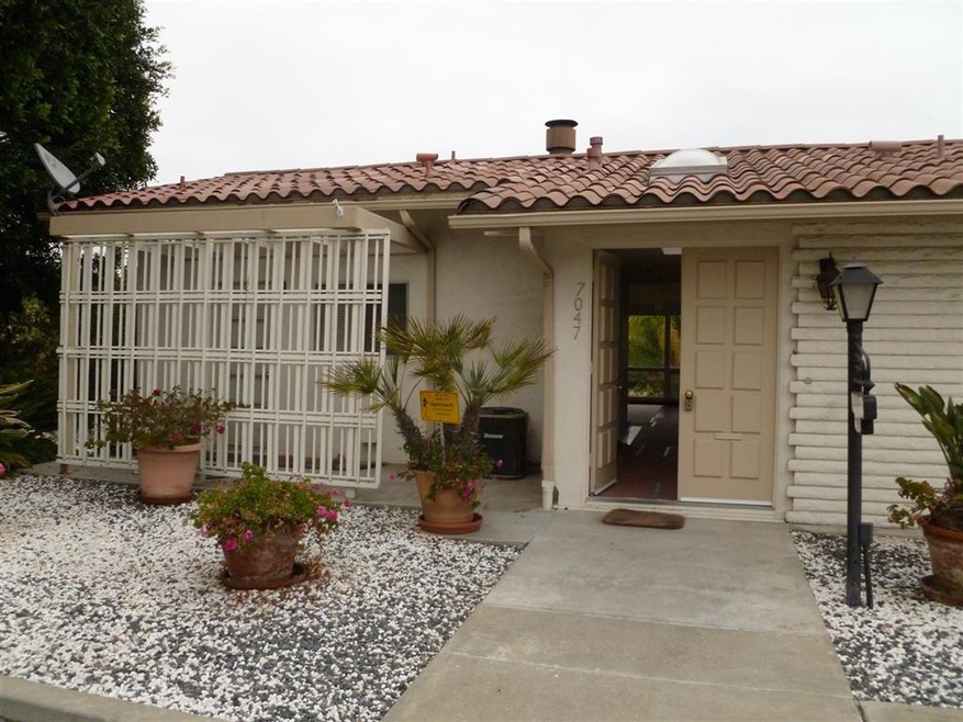 Front door and patio off kitchen.