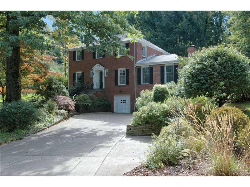 Exterior Front. Classic brick colonial situated on