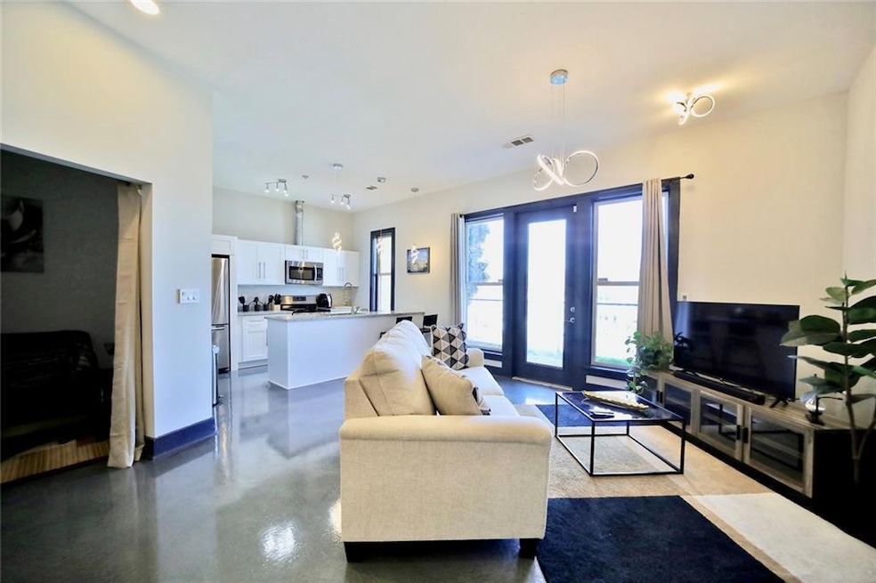 Living area featuring customized flooring