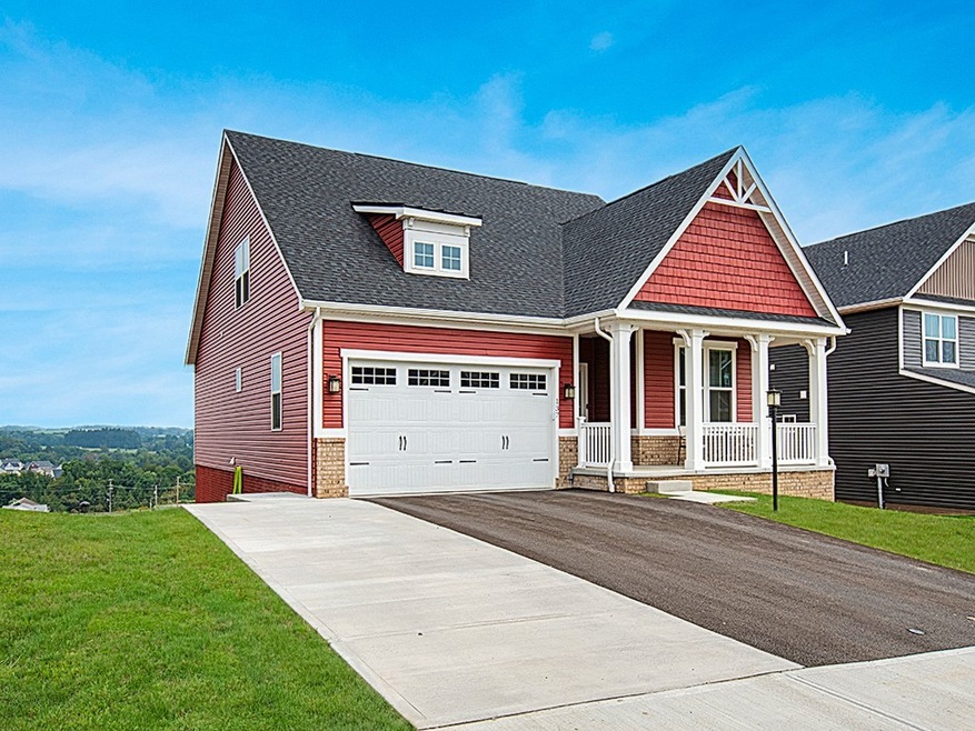 Gorgeous Ranch with added parking pad.
