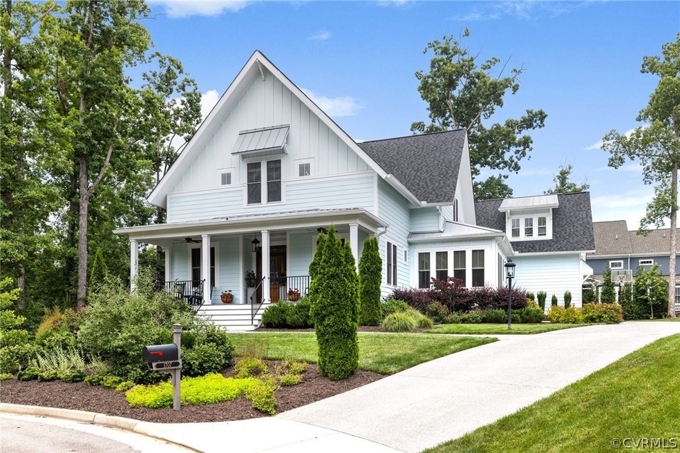 Modern farmhouse with a front yard and a porch