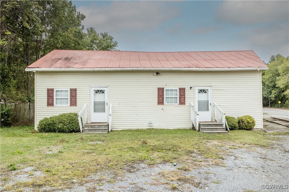 View of front of house featuring a front yard