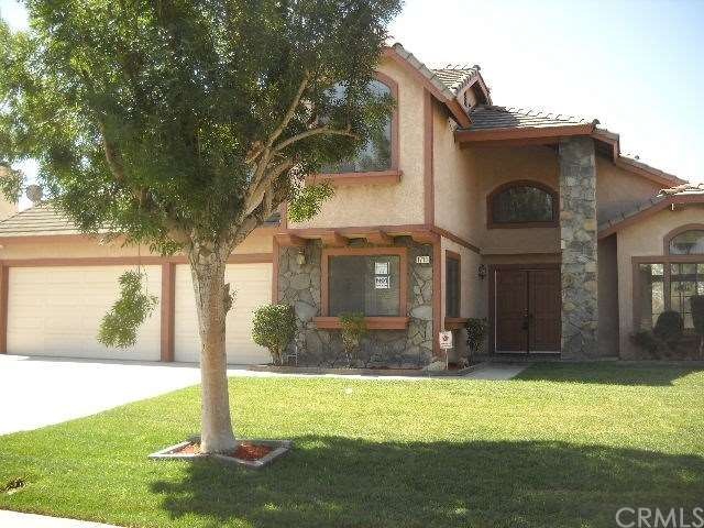 2 story with 4 bedrooms one downstairs