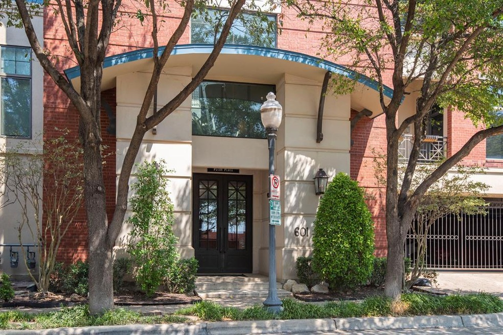 Pecan Place Condos elegant front entrance.See the 