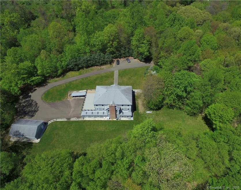 A private compound can be yours!  12 acres of the 