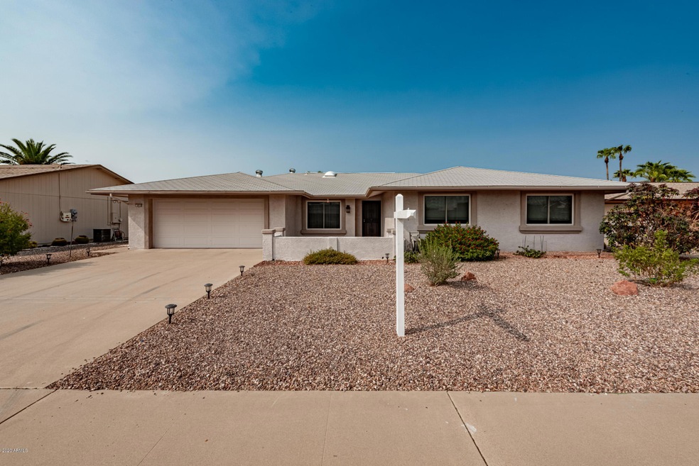 Front of home at 9712 W Timberline Dr