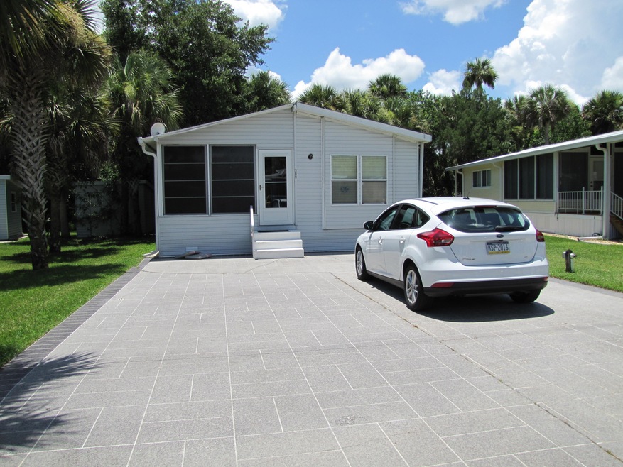 309 Plantation Dr, Titusville, FL 32780 - photo 1