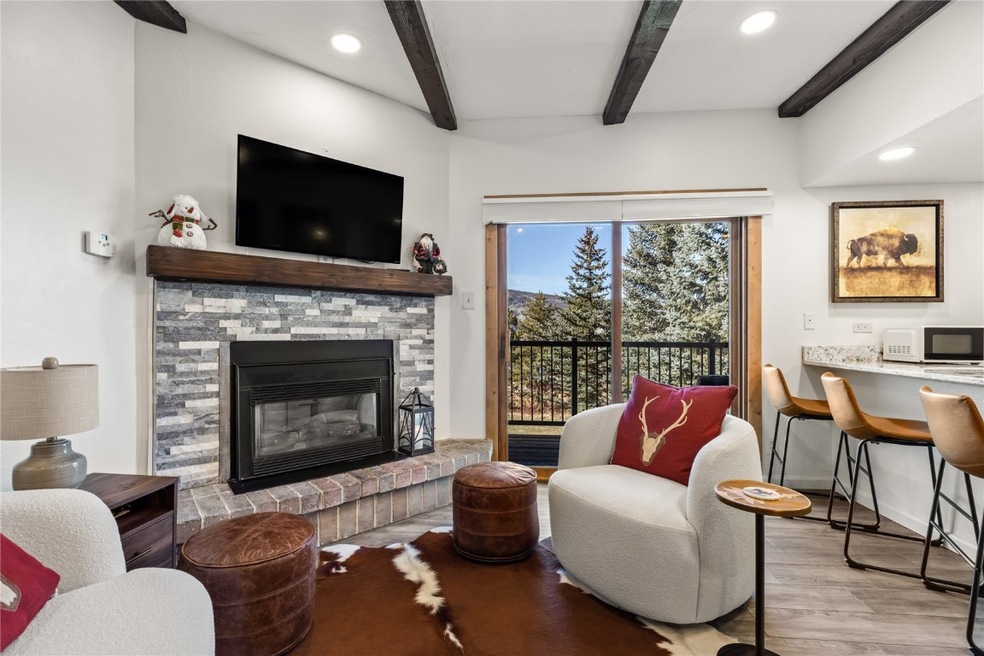Living room featuring light wood-type flooring, a