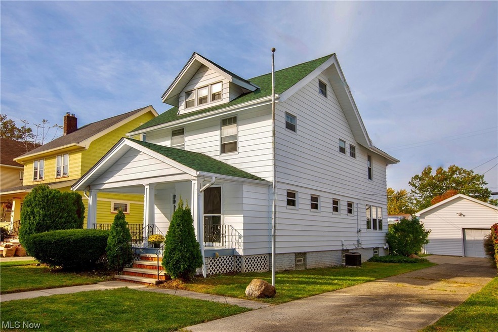 View of front of house & Newer Garage