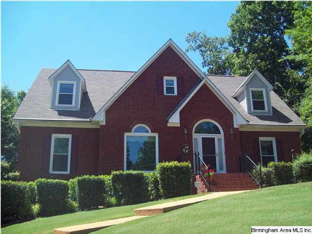 Picture Perfect Full Brick Home nestled on private