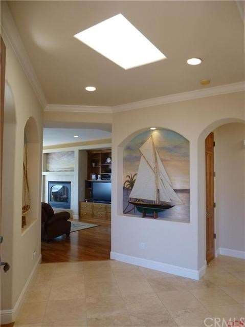 Entry way - custom faux paintings in niches, skyli