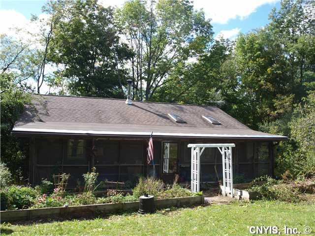 Exterior Front. Enter on enclosed front porch thro