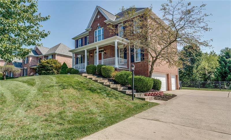 Beautiful 3 sides brick custom built home in Erhma