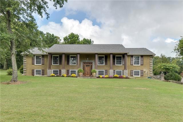Beautiful curb appeal!  This fabulous updated home has a new facade and stained wood pillars. Set on 2.4 private acres, there is plenty of room for outdoor entertaining and a large garden.  Enjoy a little bit of country in the heart of Franklin, TN! 