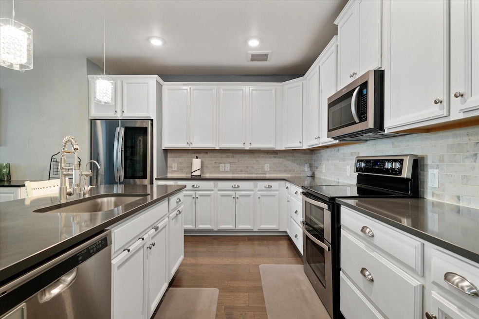 Kitchen featuring  Beautiful countertops, applianc