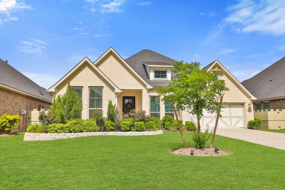 Welcome to 10021 Preserve Way located in the gated