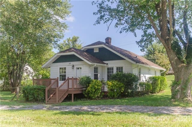 Front view with circular driveway