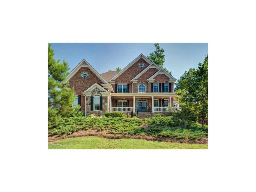 Exterior Front. Four-Sided-Brick Beauty in Champag