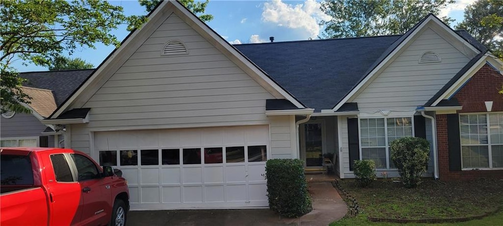 View of front of property with a garage