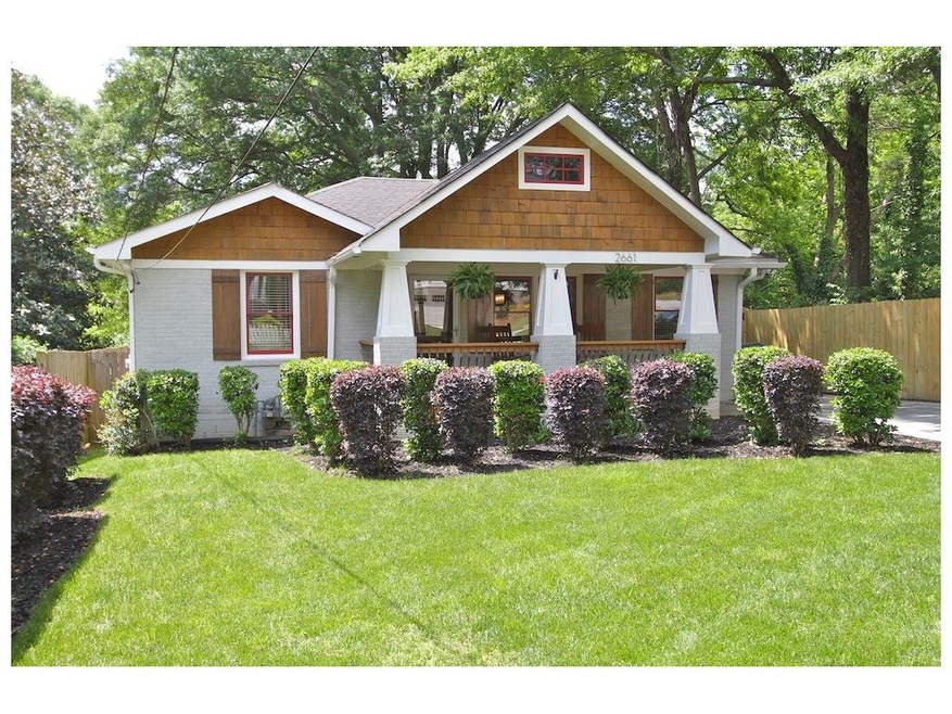 This renovated 3br/3ba brick home has tons of curb