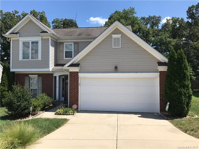 Front exterior, 2 car garage and driveway can easi