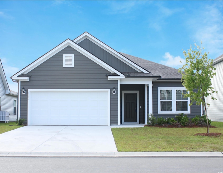 View of front of home featuring a 2-car garage