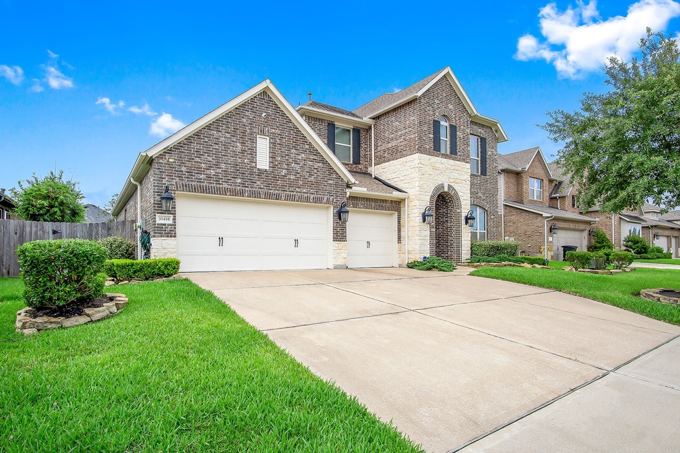31410 Postwood Oaks Ct, Spring, TX 77386 - photo 1