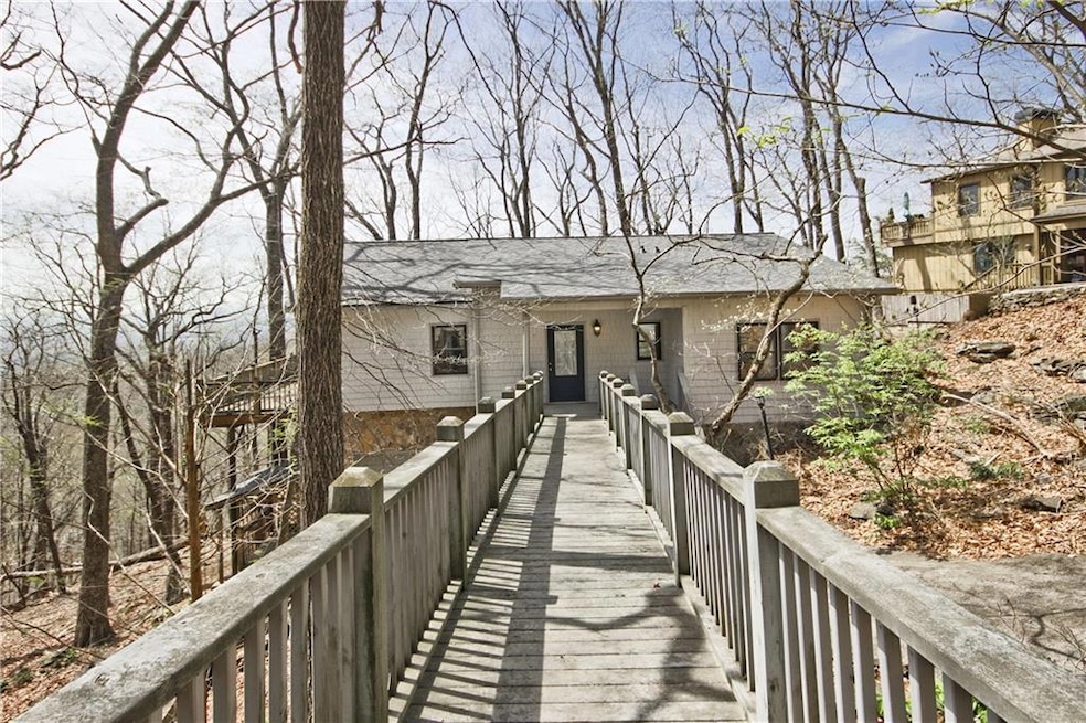 Welcome to 193 Valley View Trail.  This home has a one car garage as well as a parking pad.  This ramp leads from the parking pad into the home.