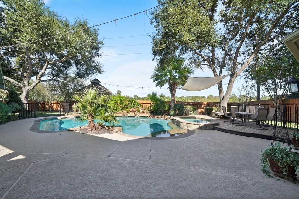 Your own background oasis. Hot tub, diving stone,