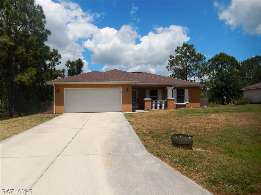 413 Broadmoor St, Lehigh Acres, FL 33974 - photo 1