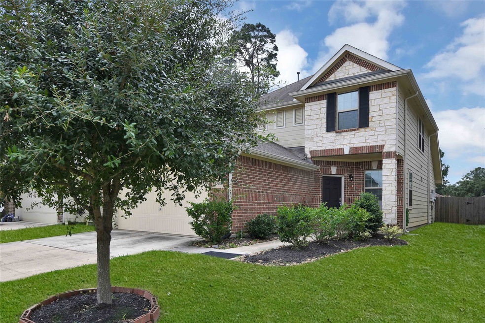 10918 Sun River Falls Dr, Humble, TX 77396 - photo 1