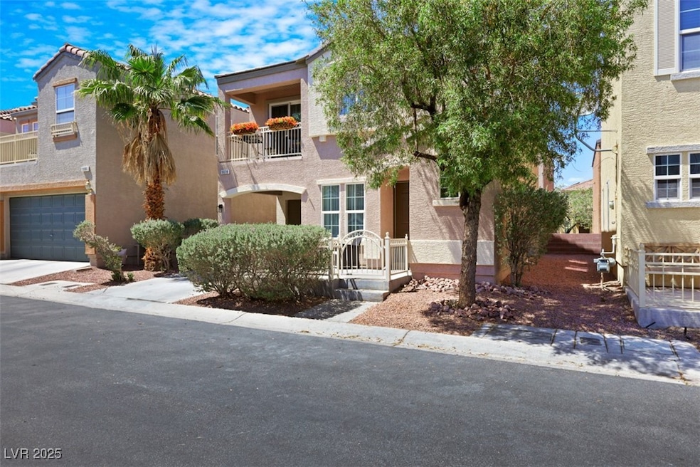 View of front of property featuring stucco siding