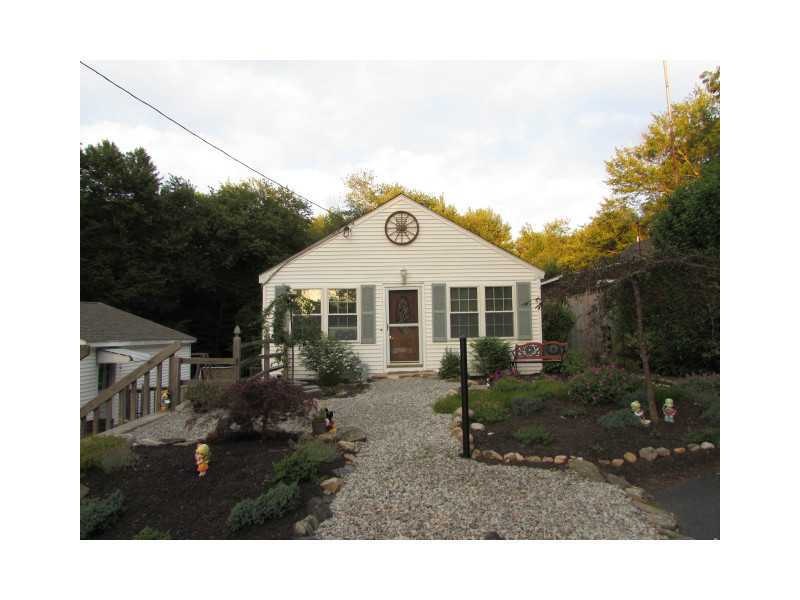 Exterior Front. Walk right in to the beautiful cat