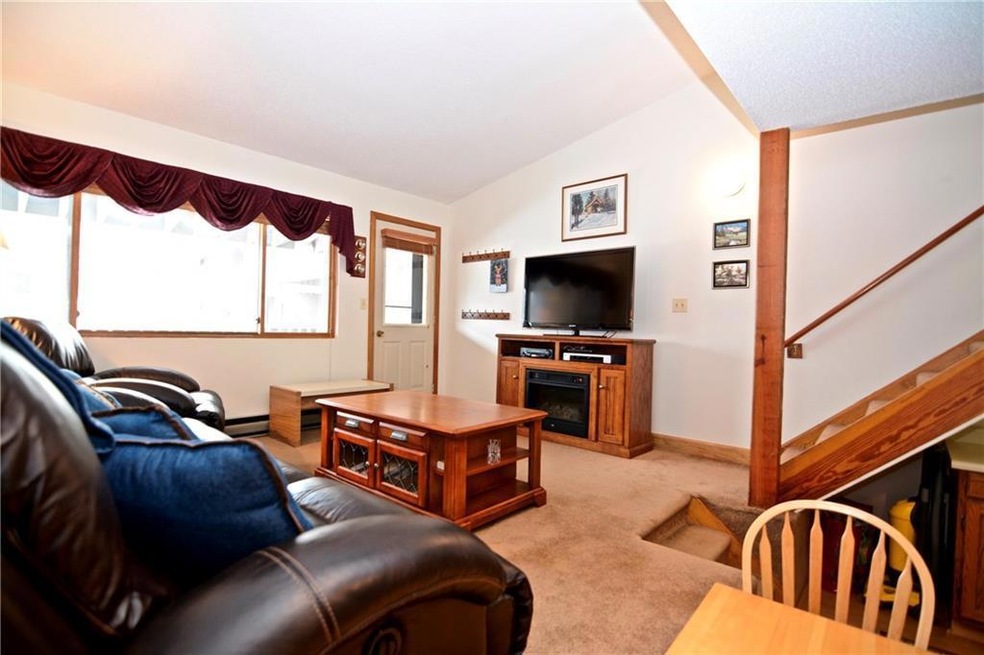 Well maintained end unit located...