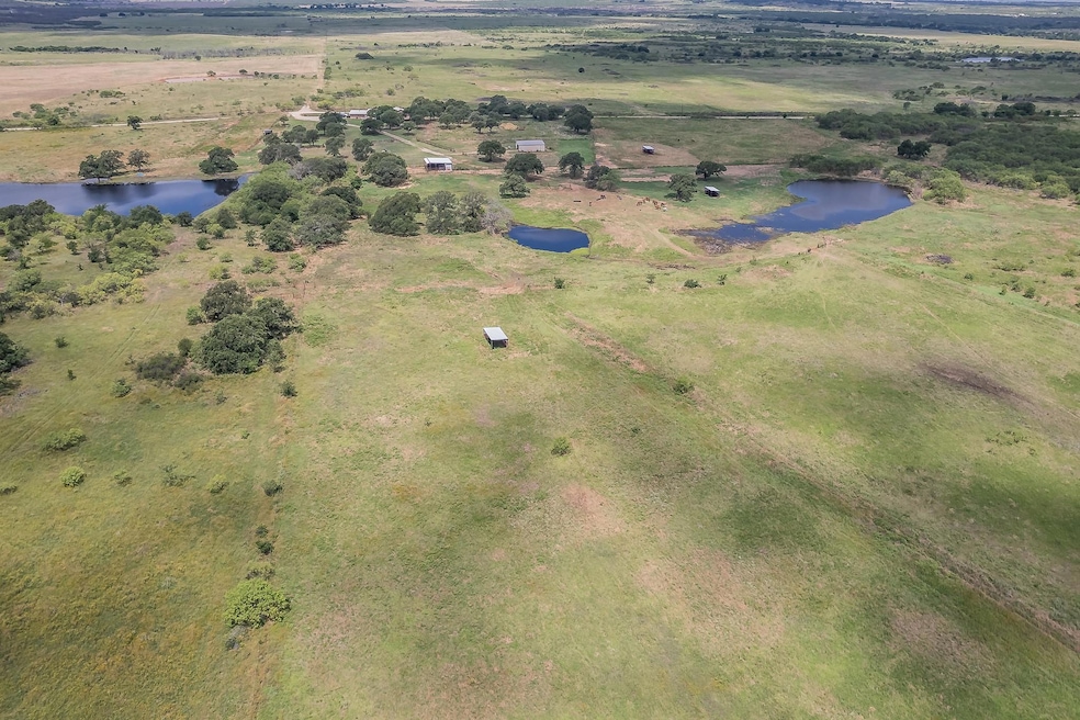 Drone / aerial view with a rural view and a water 